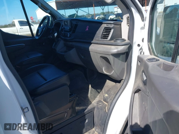 2023 Ford Transit Cargo with VIN 1FTBR1C88PKA07752, listed as a IAAI auction lot 41590510 with 71,062 mi miles and . Bid and sale history available at DreamBid. Image 5.