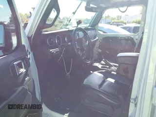 2018 Jeep Wrangler Unlimited Sahara z VIN 1C4HJXEG4JW106111, wystawiony jako IAAI lot #41994833 z przebiegiem 99 583 mil mil oraz . Historia ofert i sprzedaży dostępna na DreamBid. Obrazek 5.