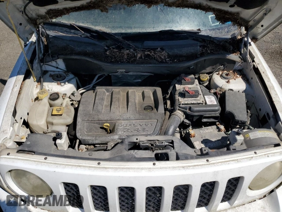 2012 Jeep Patriot Sport z VIN 1C4NJRBB6CD667450, wystawiony jako Copart lot #59135465 z przebiegiem 79 865 mil mil oraz Czysty tytuł • Clean title. Historia ofert i sprzedaży dostępna na DreamBid. Obrazek 12.