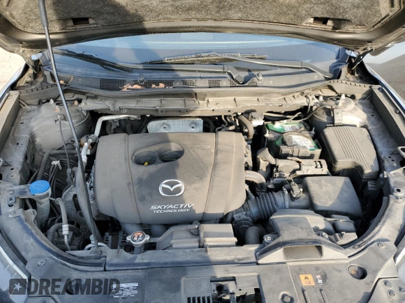 2014 Mazda CX-5 Grand Touring with VIN JM3KE4DY5E0372787, listed as a Copart auction lot 48873675 with 136,784 mi miles and Salvage Title. Bid and sale history available at carsss.com. Image 12.
