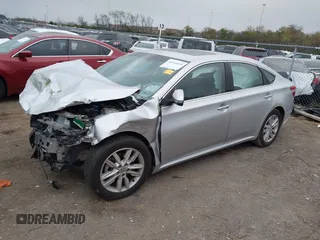 2014 Toyota Avalon Limited with VIN 4T1BK1EB8EU133085, listed as a IAAI auction lot 40949898 with 126,697 mi miles. Bid and sale history available at carsss.com. Image 2.