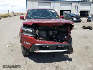 2023 Nissan Frontier PRO-4X with VIN 1N6ED1EK2PN618618, listed as a Copart auction lot 57197604 with 25,362 mi miles and Salvage Title. Bid and sale history available at carsss.com. Image 5.