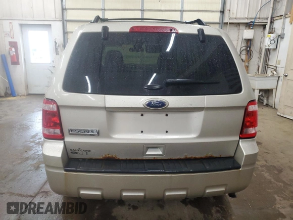 2012 Ford Escape XLT with VIN 1FMCU9D76CKC44981, listed as a Copart auction lot 57908795 with 127,594 mi miles and Salvage title. Bid and sale history available at DreamBid. Image 6.
