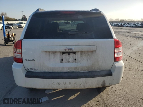 2007 Jeep Compass Sport with VIN 1J8FF47W07D199198, listed as a Copart auction lot 52092675 with 131,346 mi miles and Salvage Title. Bid and sale history available at carsss.com. Image 6.