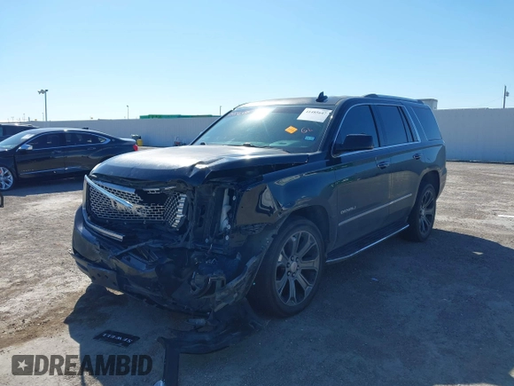 2016 GMC Yukon Denali with VIN 1GKS2CKJ8GR337441, listed as a IAAI auction lot 41485647 with 171,874 mi miles. Bid and sale history available at carsss.com. Image 17.