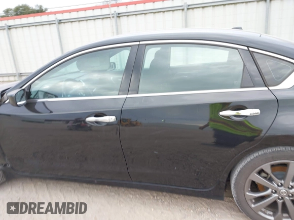 2018 Nissan Altima 2.5 SR with VIN 1N4AL3AP3JC273724, listed as a IAAI auction lot 41188355 with 148,692 mi miles. Bid and sale history available at carsss.com. Image 14.