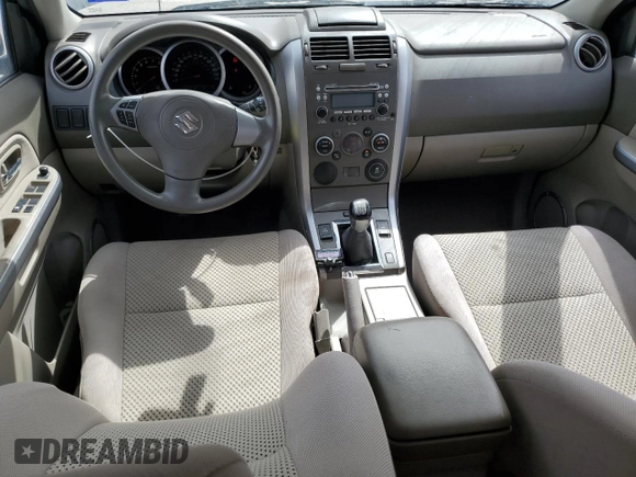 2012 Suzuki Grand Vitara z VIN JS3TE0D59C4100035, wystawiony jako Copart lot #51780435 z przebiegiem 49 620 mil mil oraz Czysty tytuł • Clean title. Historia ofert i sprzedaży dostępna na DreamBid. Obrazek 8.