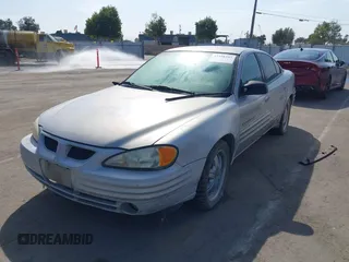 1999 Pontiac Grand Am SE with VIN 1G2NE52TXXC553246, listed as a IAAI auction lot 42398103 with Not provided miles and . Bid and sale history available at DreamBid. Image 2.