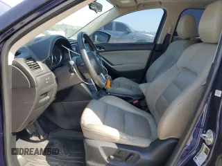 2013 Mazda CX-5 Grand Touring with VIN JM3KE2DE4D0147902, listed as a Copart auction lot 52696685 with 331,168 mi miles and Clean Title. Bid and sale history available at carsss.com. Image 7.