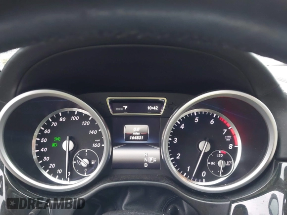 2016 Mercedes-Benz GL with VIN 4JGDF7DE3GA655476, listed as a IAAI auction lot 41710919 with 164,831 mi miles. Bid and sale history available at carsss.com. Image 7.