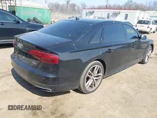2017 Audi A8 with VIN WAU44AFDXHN004395, listed as a IAAI auction lot 41705688 with 63,282 mi miles and . Bid and sale history available at DreamBid. Image 4.