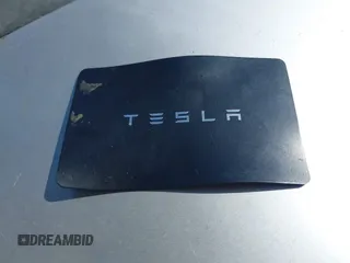 2018 Tesla Model 3 Long Range Battery with VIN 5YJ3E1EAXJF108781, listed as a IAAI auction lot 41962628 with 61,208 mi miles and . Bid and sale history available at DreamBid. Image 11.