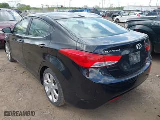 2012 Hyundai Elantra GLS with VIN KMHDH4AE8CU407441, listed as a IAAI auction lot 42125996 with 187,536 mi miles. Bid and sale history available at carsss.com. Image 3.