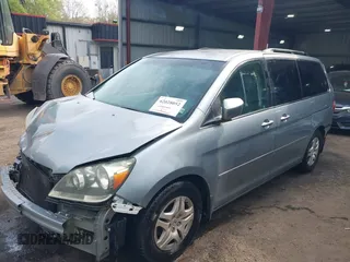 2006 Honda Odyssey EX with VIN 5FNRL38406B066176, listed as a IAAI auction lot 42028052 with 136,305 mi miles and . Bid and sale history available at DreamBid. Image 2.