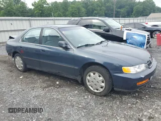 1997 Honda Accord LX with VIN 1HGCD5632VA037747, listed as a Copart auction lot 63532415 with 118,499 mi miles and Salvage title. Bid and sale history available at DreamBid. Image 4.