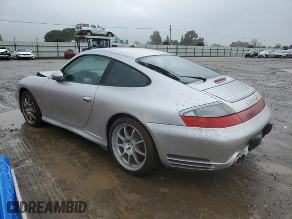 2003 Porsche 911 z VIN WP0AA29983S620988, wystawiony jako Copart lot #49378715 z przebiegiem 99 291 mil mil oraz Szkoda całkowita • Salvage title. Historia ofert i sprzedaży dostępna na DreamBid. Obrazek 2.