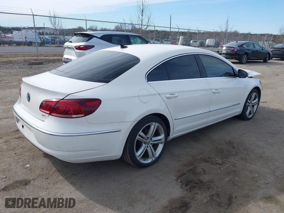 2013 Volkswagen CC Sport with VIN WVWBP7AN2DE546296, listed as a IAAI auction lot 41763823 with 102,028 mi miles. Bid and sale history available at carsss.com. Image 4.