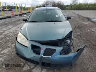 2009 Pontiac G6 1SA z VIN 1G2ZG57N094107142, wystawiony jako Copart lot #53905385 z przebiegiem Nie podano mil oraz Szkoda całkowita • Salvage title. Historia ofert i sprzedaży dostępna na DreamBid. Obrazek 5.