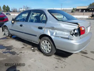 1999 Honda Civic LX with VIN JHMEJ6670XS000958, listed as a IAAI auction lot 41620949 with 93,698 mi miles and . Bid and sale history available at DreamBid. Image 3.