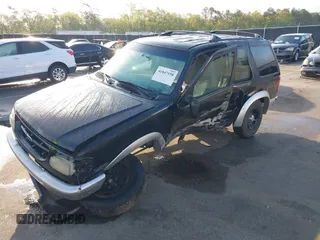 1998 Ford Explorer Sport with VIN 1FMYU22X2WUC74696, listed as a IAAI auction lot 41847158 with 243,830 mi miles and . Bid and sale history available at DreamBid. Image 17.