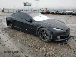 2021 Tesla Model S Long Range Plus z VIN 5YJSA1E2XMF427618, wystawiony jako Copart lot #41654955 z przebiegiem Nie podano mil oraz Szkoda całkowita • Salvage title. Historia ofert i sprzedaży dostępna na DreamBid. Obrazek 4.