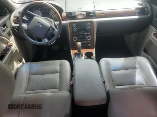 2008 Ford Taurus Limited z VIN 1FAHP25WX8G181771, wystawiony jako Copart lot #58026275 z przebiegiem 187 911 mil mil oraz Tytuł czysty. Historia ofert i sprzedaży dostępna na DreamBid. Obrazek 8.