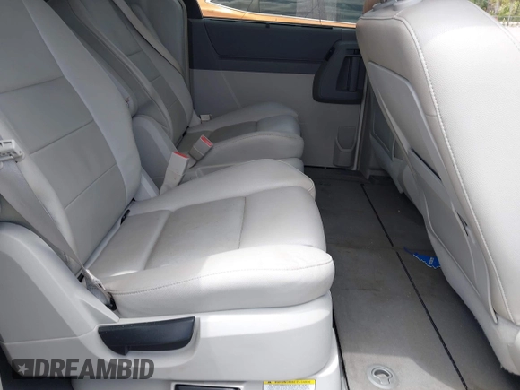 2008 Dodge Grand Caravan SXT with VIN 2D8HN54P58R839914, listed as a IAAI auction lot 42170038 with 152,736 mi miles and . Bid and sale history available at DreamBid. Image 8.