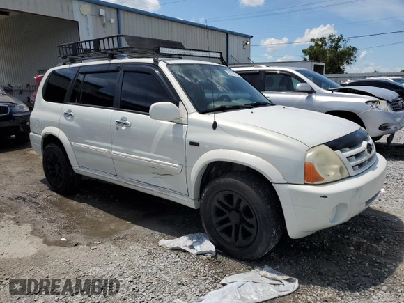 2004 Suzuki XL7 LX with VIN JS3TX92V444107106, listed as a Copart auction lot 62322035 with 94,380 mi miles and Salvage title. Bid and sale history available at DreamBid. Image 4.