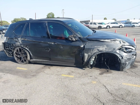 2016 BMW X5 M with VIN 5YMKT6C51G0R79331, listed as a IAAI auction lot 40590865 with 80,772 mi miles. Bid and sale history available at carsss.com. Image 13.
