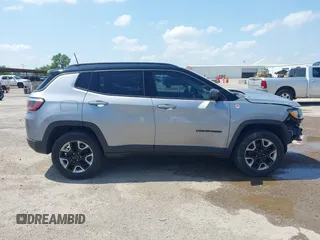 2018 Jeep Compass Trailhawk with VIN 3C4NJDDB2JT198784, listed as a IAAI auction lot 42405539 with 121,553 mi miles and . Bid and sale history available at DreamBid. Image 14.