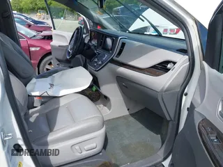2015 Toyota Sienna Limited with VIN 5TDDK3DC9FS119513, listed as a IAAI auction lot 42290386 with 210,948 mi miles and . Bid and sale history available at DreamBid. Image 5.