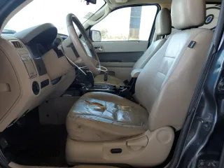 2010 Ford Escape Hybrid z VIN 1FMCU5K30AKA77460, wystawiony jako Copart lot #56363305 z przebiegiem 294 973 mil mil oraz Czysty tytuł • Clean title. Historia ofert i sprzedaży dostępna na DreamBid. Obrazek 7.