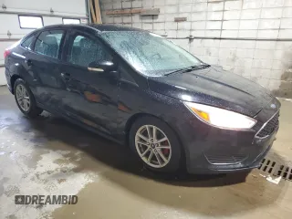 2017 Ford Focus SE with VIN 1FADP3F23HL244667, listed as a Copart auction lot 57597125 with 166,730 mi miles and Salvage title. Bid and sale history available at DreamBid. Image 4.
