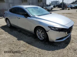 2019 Mazda 3 with VIN 3MZBPABL8KM112754, listed as a Copart auction lot 60616045 with 77,292 mi miles and Clean title. Bid and sale history available at DreamBid. Image 4.