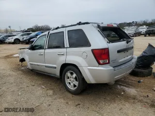 2007 Jeep Grand Cherokee Laredo with VIN 1J8GS48K37C572610, listed as a Copart auction lot 48337465 with 203,249 mi miles and Salvage Title. Bid and sale history available at carsss.com. Image 2.
