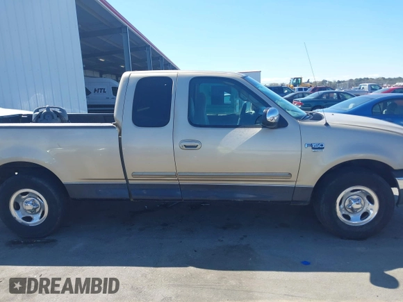 2000 Ford F-150 XL with VIN 1FTRX17L8YNB02069, listed as a IAAI auction lot 41813272 with 279,042 mi miles and . Bid and sale history available at DreamBid. Image 13.