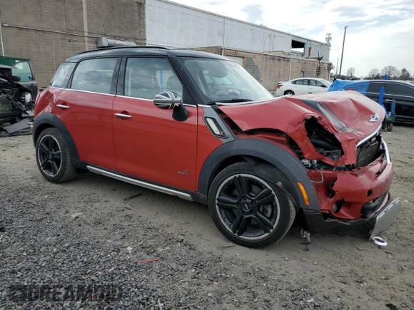 2016 MINI Countryman S with VIN WMWZC5C51GWU01015, listed as a Copart auction lot 51223155 with 74,602 mi miles and Salvage Title. Bid and sale history available at DreamBid. Image 4.