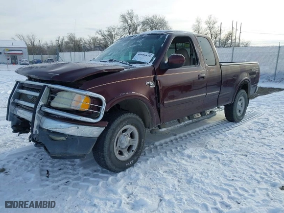 2000 Ford F-150 XL with VIN 1FTRX18L2YNA50128, listed as a IAAI auction lot 40956879 with 1 mi miles. Bid and sale history available at carsss.com. Image 2.