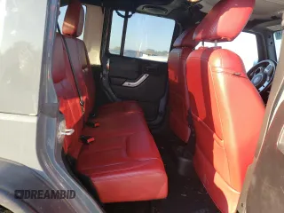 2013 Jeep Wrangler Unlimited Rubicon 10th Anniversary z VIN 1C4HJWFG0DL704100, wystawiony jako Copart lot #75573634 z przebiegiem 103 158 mil mil oraz Szkoda całkowita • Salvage title. Historia ofert i sprzedaży dostępna na DreamBid. Obrazek 11.