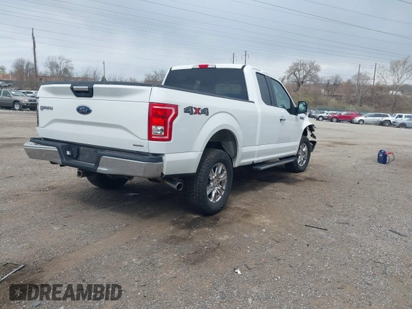 2015 Ford F-150 XLT with VIN 1FTFX1EFXFFC18381, listed as a IAAI auction lot 41886719 with 162,644 mi miles and . Bid and sale history available at DreamBid. Image 4.