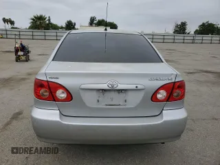 2005 Toyota Corolla CE with VIN 1NXBR32E05Z433886, listed as a Copart auction lot 53670115 with 169,213 mi miles and Salvage title. Bid and sale history available at DreamBid. Image 6.