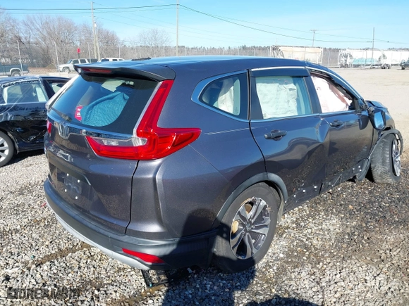 2017 Honda CR-V LX with VIN 7FARW5H32HE003355, listed as a IAAI auction lot 41365147 with 46,649 mi miles. Bid and sale history available at carsss.com. Image 4.