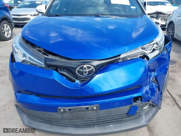 2019 Toyota C-HR XLE with VIN NMTKHMBX8KR079399, listed as a IAAI auction lot 41701134 with 71,892 mi miles. Bid and sale history available at carsss.com. Image 6.
