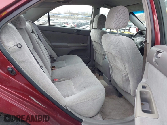 2004 Toyota Camry LE with VIN 4T1BE32K84U307551, listed as a IAAI auction lot 42054571 with 115,513 mi miles. Bid and sale history available at carsss.com. Image 8.