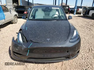 2024 Tesla Model Y Long Range with VIN 7SAYGDEE9RA221380, listed as a Copart auction lot 47516705 with 10,930 mi miles and Salvage Title. Bid and sale history available at DreamBid. Image 5.