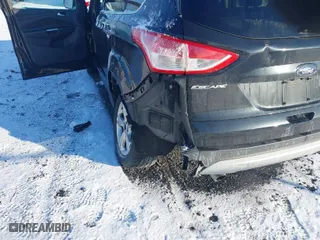2015 Ford Escape SE with VIN 1FMCU0G74FUB57399, listed as a IAAI auction lot 41356046 with 179,713 mi miles. Bid and sale history available at carsss.com. Image 6.