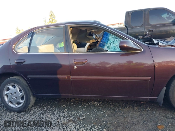 1999 Nissan Altima XE with VIN 1N4DL01D7XC147120, listed as a IAAI auction lot 41467346 with Not Provided miles and . Bid and sale history available at carsss.com. Image 12.