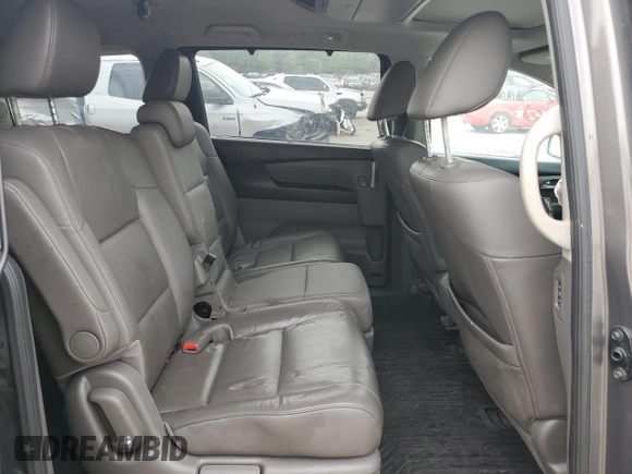 2012 Honda Odyssey Touring with VIN 5FNRL5H94CB109257, listed as a Copart auction lot 59636075 with 107,543 mi miles and Salvage title. Bid and sale history available at DreamBid. Image 11.