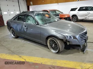 2017 Cadillac CTS Luxury AWD with VIN 1G6AX5SX2H0145966, listed as a Copart auction lot 55835324 with Not provided miles and Salvage title. Bid and sale history available at DreamBid. Image 4.