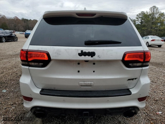 2021 Jeep Grand Cherokee SRT with VIN 1C4RJFDJ1MC561144, listed as a Copart auction lot 83961214 with 49,989 mi miles and Salvage Title. Bid and sale history available at carsss.com. Image 6.